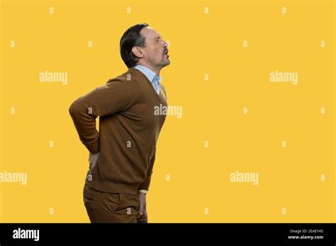 Side View Middle Aged Man Is Suffering From Back Pain Stock Photo Alamy