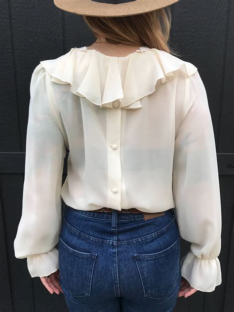 70 s ivory ruffle long sleeved blouse ruffle sleeve blouse fashion trending outfits