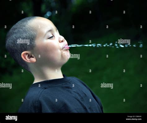 Spitting Boy Hi Res Stock Photography And Images Alamy