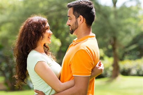 Use them in commercial designs under lifetime, perpetual & worldwide rights. Romantic Indian Couple Hugging Outdoors Stock Photo ...
