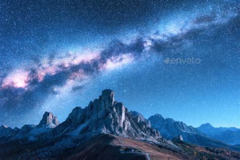 Milky Way Above Mountains At Night In Autumn In Dolomites Italy Stock