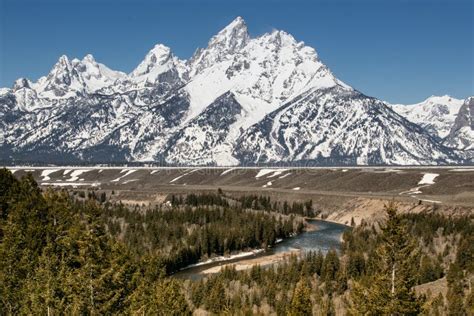 Gorgeous Landscape Of The Snowy Peaks Of The Teton Mountains In The