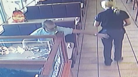 Restaurant Customer Caught On CCTV Slapping Waitress On Backside While His Wife Went To The