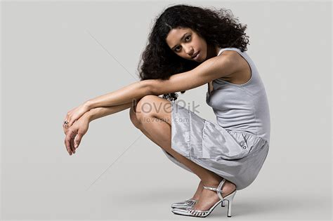 Woman In Skirt Squatting Picture And Hd Photos Free Download On Lovepik