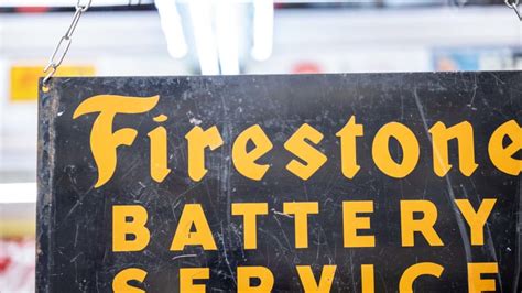 Firestone Double-Sided Tin Sign at The World’s Largest Road Art Auction