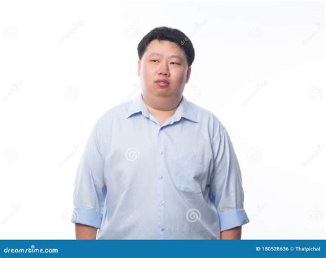 Asian Fat Man In Blue Shirt Thinking And Looking To Copyspace Isolated