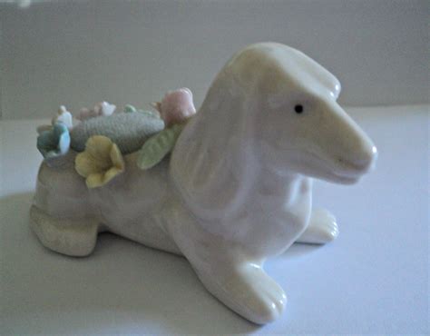 Dachshund Dog Pin Cushion With Ceramic Flowers Doxie Hot Dog Figurine