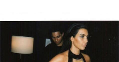 kim kardashian flashes side boob while squeezing her curves into balmain sample sizes see the