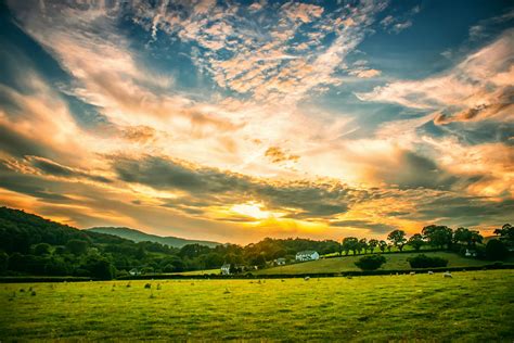 Grey Cloudy Sunset Sky Over The Farm Field · Free Stock Photo