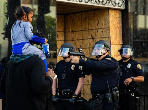 Us Riots Rubber Bullet Gun Pointed At Child At Long Beach Protest