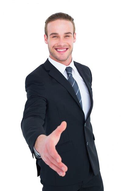Premium Photo Businessman Smiling And Offering His Hand