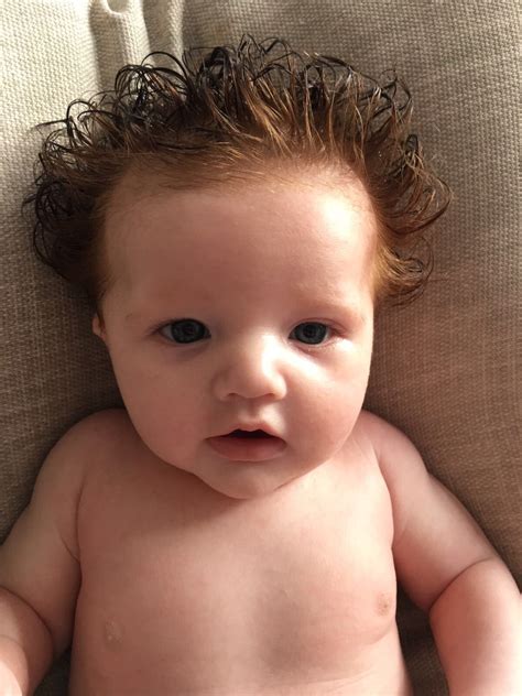 Proud Parents Show Off Gorgeous Week Old Baby Born With Mop Of Thick