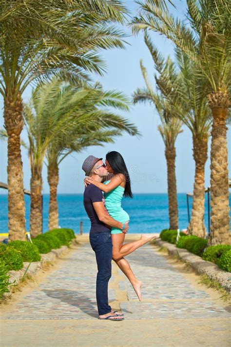 Couple Kissing In Romantic Embrace On Beach Stock Image Image Of