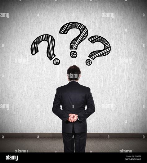 Businessman Thinking With Question Mark Over Head Stock Photo Alamy