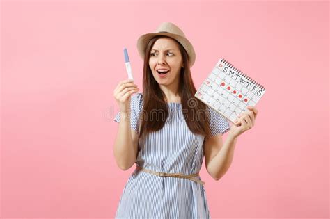 Shocked Sad Woman In Blue Dress Hat Hold In Hand Pregnancy Test