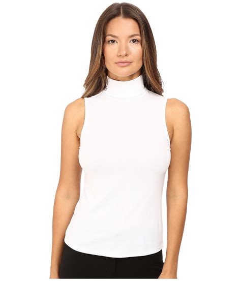 theory wendel ribbed viscose sleeveless turtleneck top in white lyst