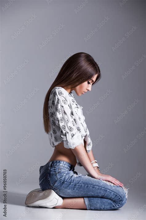 Submissive Young And Attractive Sexy Girl In Nice Outfit Posing Calmly