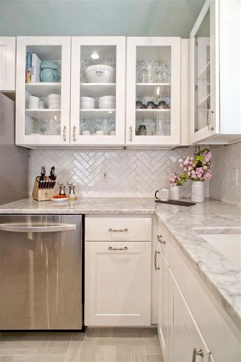 The dark, moody tile walls, sleek the designers created extra storage below the sink for tools and other essentials by hanging. 2019 Small Kitchen Design Ideas - Compact But Stylish
