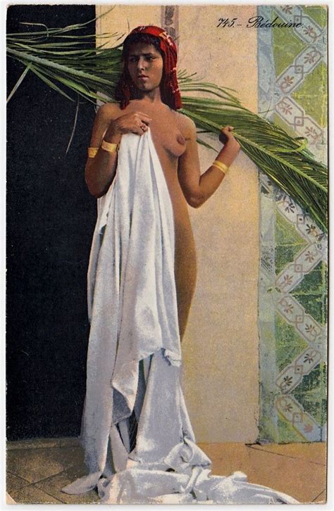A Painting Of A Woman In White Cloths With Palm Leaves On Her Head And Chest