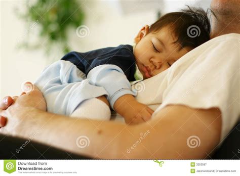 Baby Sleeping On Dads Chest Royalty Free Stock