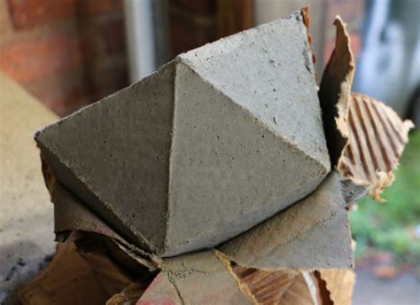 You can use foil or a tin pan for the mold. Over on eHow: DIY Geometric Concrete Bookends | 17 Apart