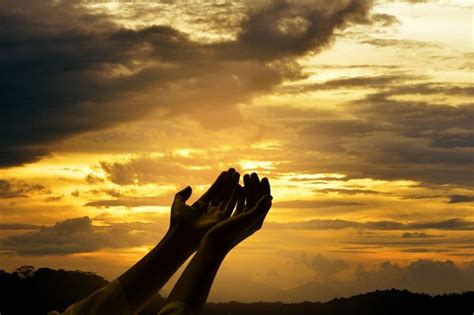 Premium Photo Male Hands With Open Palm Praying To God Sunrise
