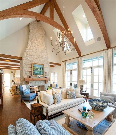 Stunning cottage living room features a vaulted plank ceiling with three skylights inviting natural light into the space. Living Room Feng Shui Ideas, Tips And Decorating Inspirations