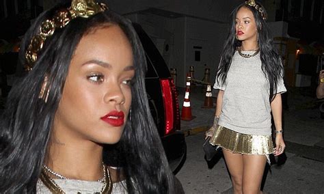 Rihanna Shows Off Her Slender Pins In Tiny Gold Skirt And Headpiece