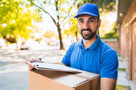 Premium Photo Delivery Man Carrying Package Outdoors