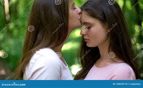 Lesbian Kissing Forehead Of Her Loving Girlfriend Gentle Attitude