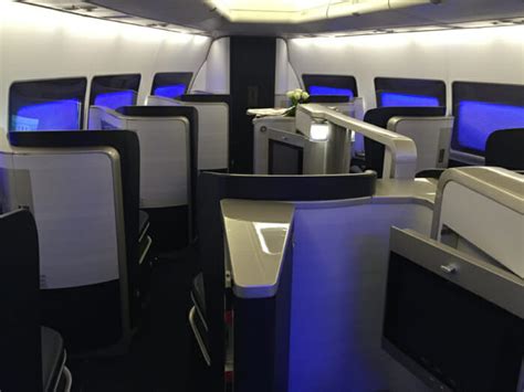 The seats 1a and 1k are located close to the closet and do not have overhead bin storage. Review: British Airways First Class 747 (LHR-LAS) - Part 1