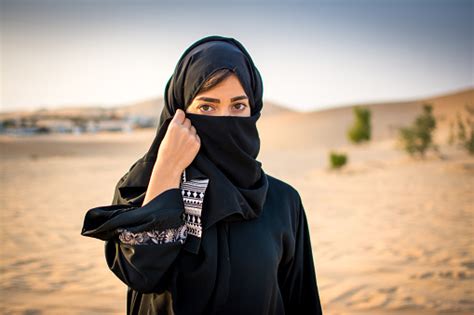 Portrait Of Beautiful Muslim Woman Wearing Traditional Arabian Clothing