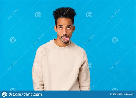 Bored And Unamused Caucasian Man Standing White Background Reluctant