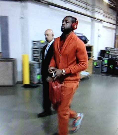 Caption The Photo Dwyane Wade All Orange Everything And Man Purse Outfit