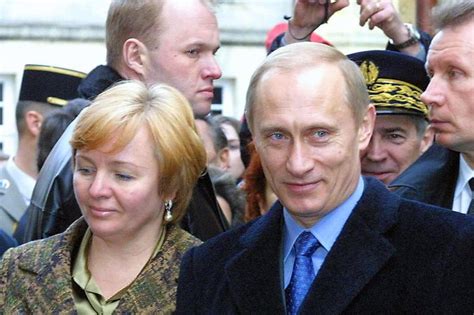Photos Of Vladimir Putin And His Wife Looking Miserable Together