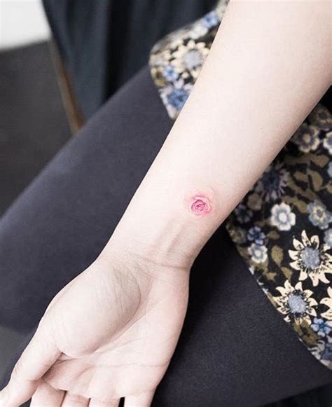 Pink Rose Dainty Hand Tattoo Dainty Rose Tattoos In 2020 Rose Rib