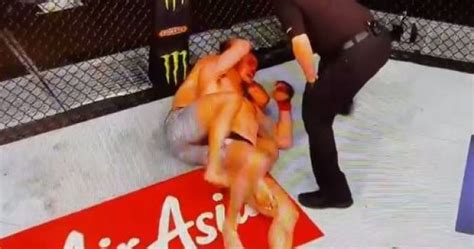 Georges St Pierre Chokes Michael Bisping Unconscious To Become UFC