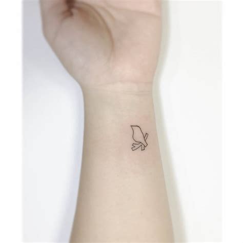 Fine Line Bird Tattoo Located On The Wrist