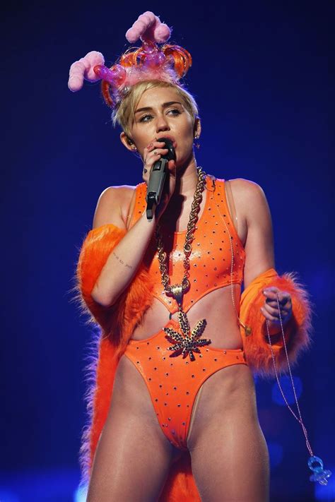 Miley Cyrus S Best Stage Looks Of All Time Miley Cyrus Photoshoot Miley Cyrus Bikini Miley