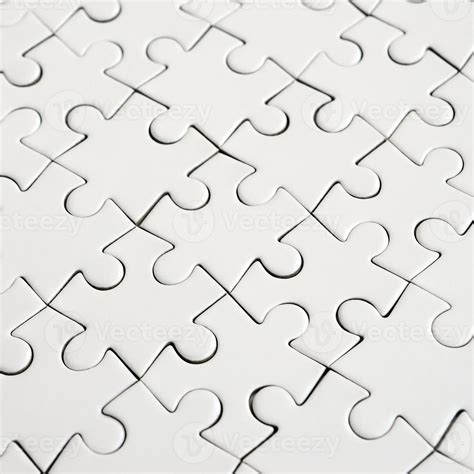 Close Up Of A White Jigsaw Puzzle In Assembled State In Perspective Many Components Of A Large