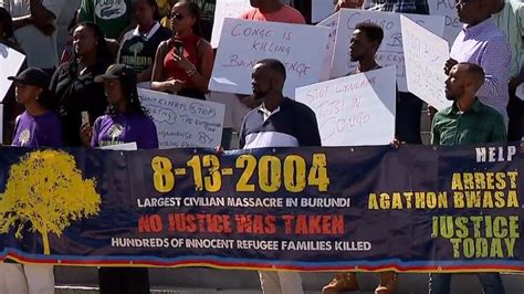 Protesters Gather At Portland City Hall To Raise Awareness About 2004 Massacre In Burundi