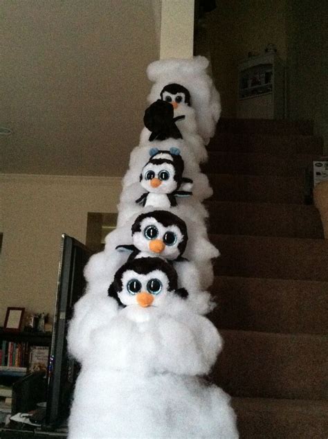 Winter Themed Banister Penguins Sliding Down Railing