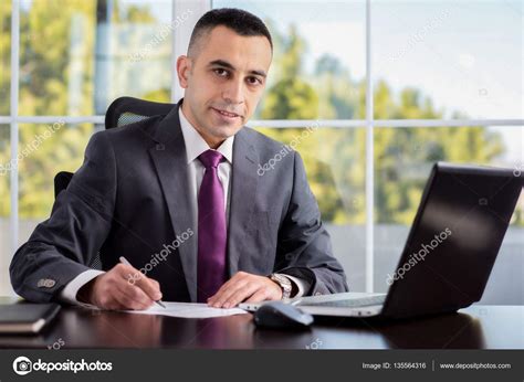 Young Businessman Portrait — Stock Photo © Ilkercelik 135564316