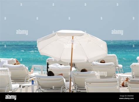 People Sunbathing On Miami Beach High Resolution Stock Photography And