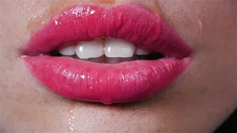 Water Drops Drip On Beautiful Female Lips Сlose Up Woman Seductively
