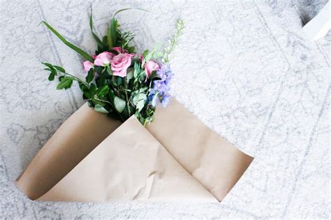 Cut two 2' pieces of the thinner ribbon. How To Wrap a Bouquet of Fresh Flowers - Pretty in the ...