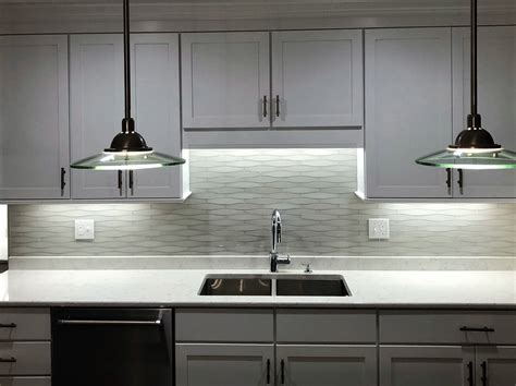 A mirrored kitchen backsplash is a good small kitchen design addition to make the space feel large and brighter, plus, it can provide an intriguing new perspective. Beautiful modern glass kitchen backsplash from Tile ...