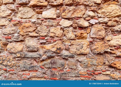 Old Antique Masonry Walls Made Of Stone The Texture Of A Gray Stone Wall Royalty Free Stock