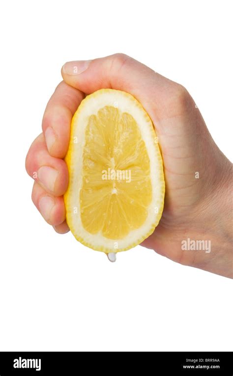 Hand Squeezing A Lemon Stock Photo Alamy