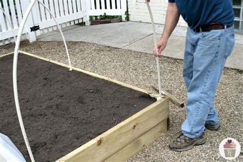 This wooden box stays low to the ground like a traditional garden bed but with raised walls and a protective bottom that keep the plants safe. How to Make a Raised Garden Bed Cover - Back to nature